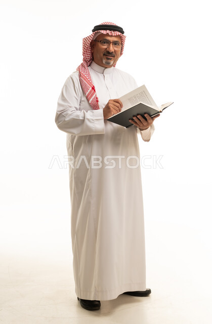 Middle-aged Saudi Man Reading Book on White Background