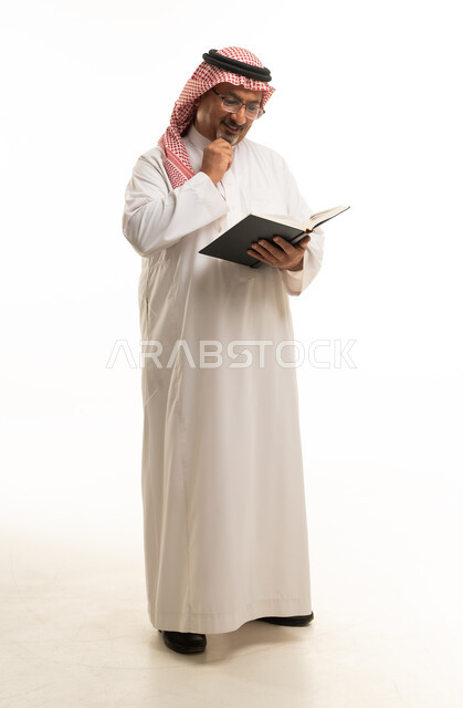 Middle Aged Saudi Man Reading Book on White Background
