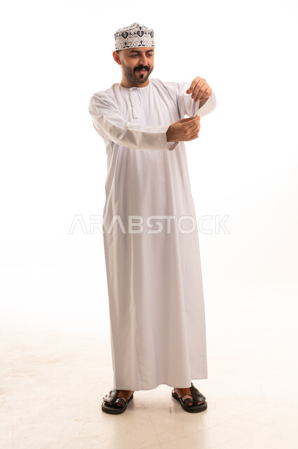 Omani Man in Traditional Dishdasha on White Background