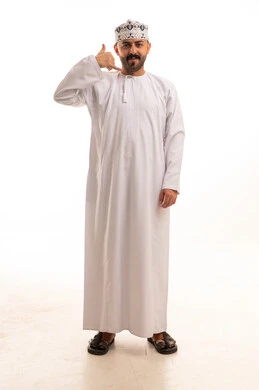 Omani Man in Traditional Dress Making Call Gesture