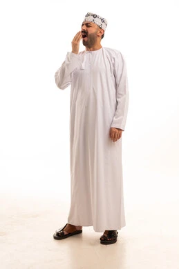 Omani Man in Traditional Dress Yawning on White Background