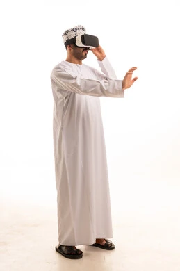 Omani Man in Traditional Dress Using VR Headset