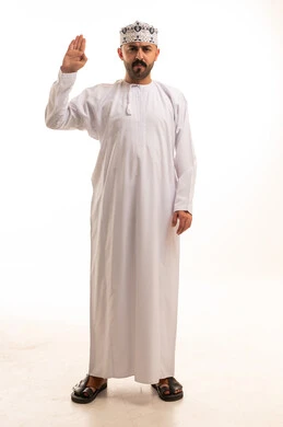 Omani Man in Traditional White Dishdasha Swearing Oath