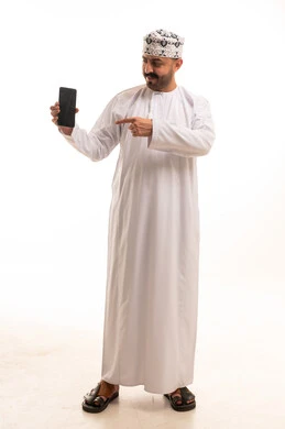 Omani Man in Traditional Dress Pointing at Smartphone