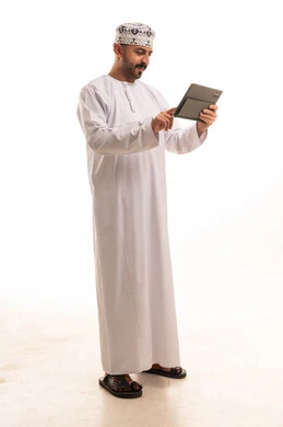 Omani Man with Tablet on White Background