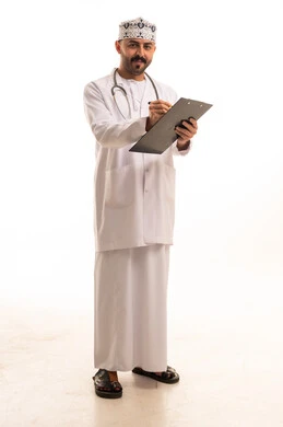 Omani Male Doctor with Clipboard and Stethoscope