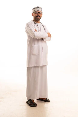 Omani Male Doctor in White Lab Coat