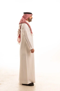 Saudi Man in Traditional White Thobe Profile View