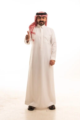 Saudi Man in Traditional Thobe Giving Thumbs Up