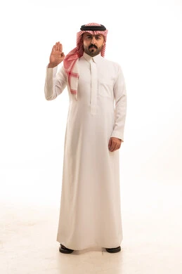 Saudi Man in Traditional Thobe Making Stop Gesture