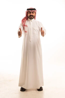 Saudi Man in Traditional Thobe Giving Thumbs Up