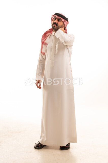 Saudi Man in Traditional Thobe with Neck Pain Studio Shot