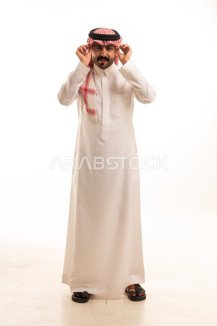 Saudi Man in Traditional Thobe and Shemagh Studio Shot
