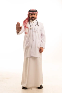Saudi Doctor in Lab Coat with Stop Gesture