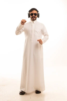 Saudi Man in Thobe with Headphones Dancing