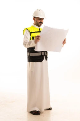 Saudi Engineer with Blueprint and Safety Gear