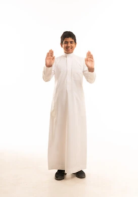 Saudi Boy in Traditional White Thobe Studio Portrait