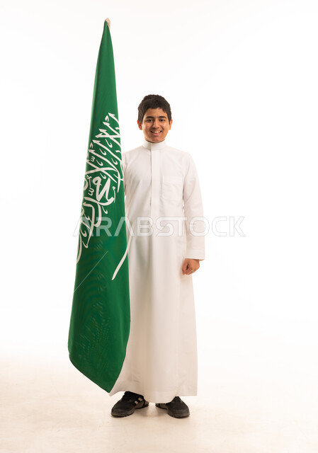Saudi Boy Holding National Flag on White Background