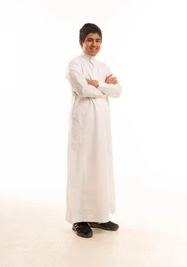 Saudi Boy in Traditional White Thobe on White Background