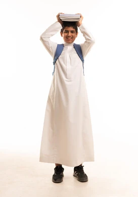 Saudi Schoolboy in Thobe with Books on White Background