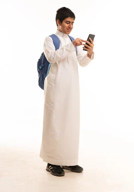 Saudi Student in White Thobe with Backpack and Phone