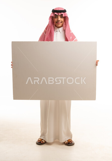 Young Saudi Man Holding Blank White Advertising Board