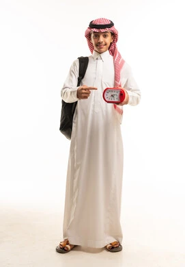 Saudi Student with Backpack and Alarm Clock Studio