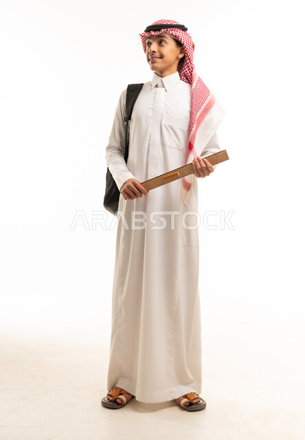 Saudi Student in Thobe with Backpack and Ruler