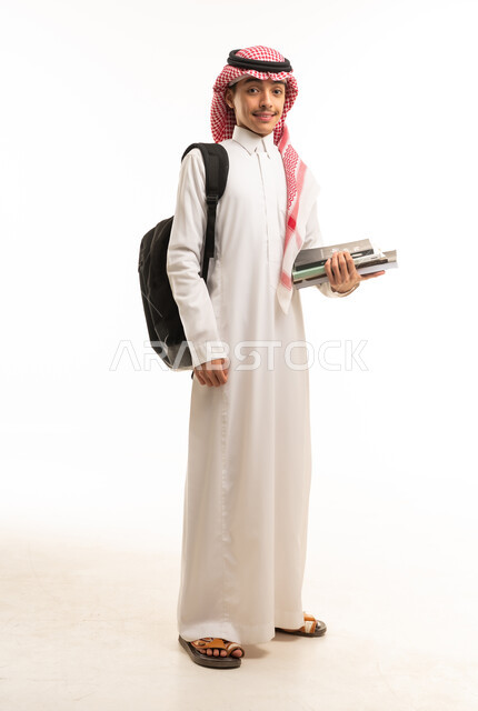 Saudi Male Student in Traditional Thobe with Backpack