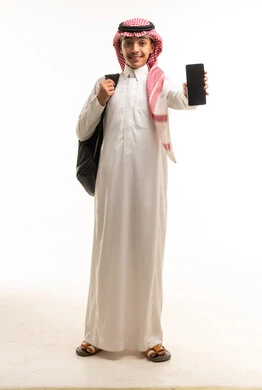 Saudi Student in Traditional Dress Holding Smartphone