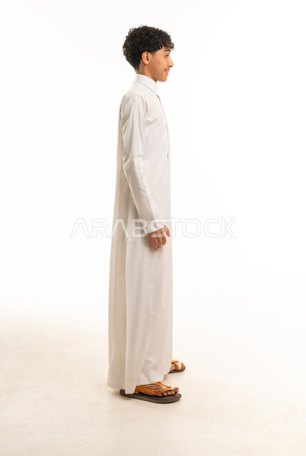 Saudi Man in Traditional White Thobe Profile View