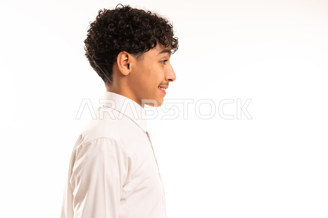 Young Saudi Man in Traditional White Thobe Profile View