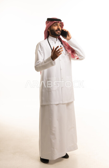Saudi Male Doctor Talking on Phone with Stethoscope