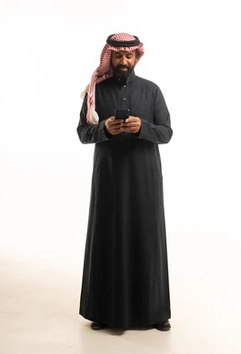 Saudi Man in Black Thobe Using Smartphone Studio