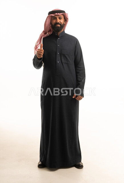 Saudi Man in Traditional Thobe with Thumbs Up Gesture