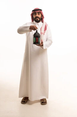 Saudi Man in Traditional Thobe Holding Ramadan Lantern