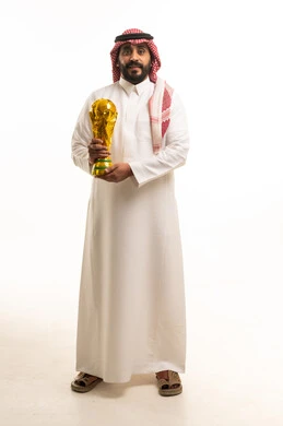 Saudi Man Holding Golden Sports Trophy