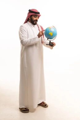 Saudi Man in Traditional Dress Holding a World Globe