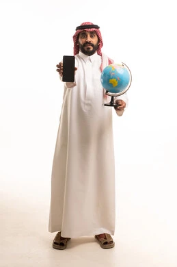 Saudi Man with Smartphone and Globe Studio Shot