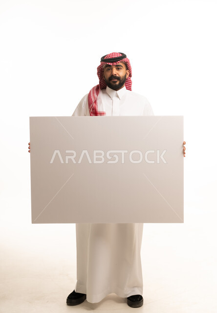 Saudi Man Holding Blank White Board in Studio