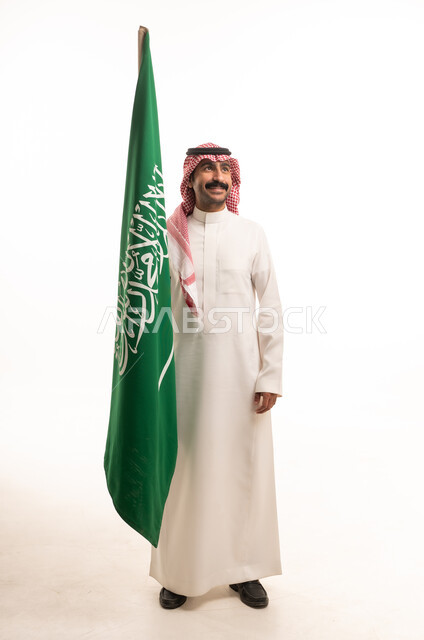 Saudi Man Holding National Flag on White Background