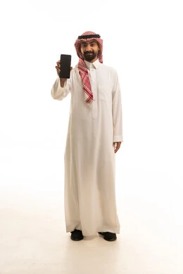 Saudi Man Holding Smartphone on White Background