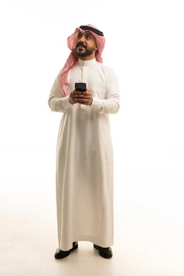Saudi Man with Smartphone on White Background