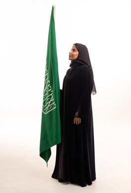 Saudi Woman with National Flag in Studio