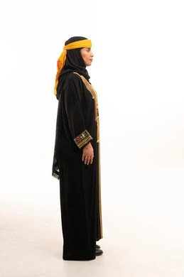 Saudi Woman in Traditional Najdi Dress Profile View