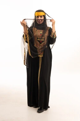 Saudi Woman in Traditional Embroidered Dress Studio Shot