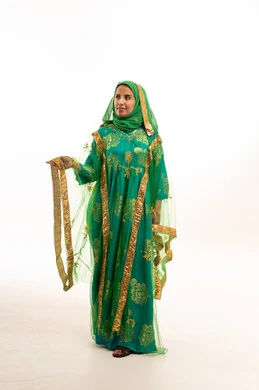 Emirati Woman in Traditional Green Nashal Dress