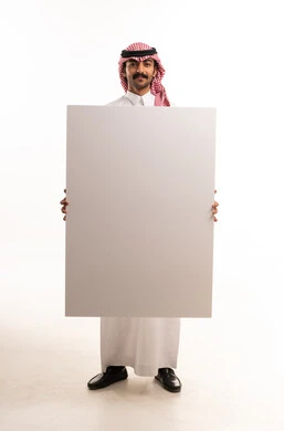 Saudi Man Holding Blank White Board in Studio