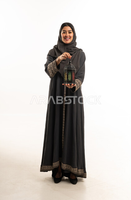 Saudi Woman Holding Ramadan Lantern in Studio