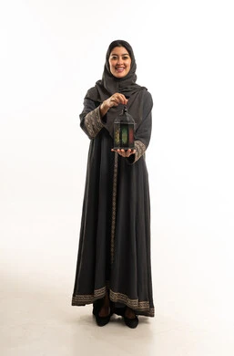 Saudi Woman Holding Ramadan Lantern in Studio
